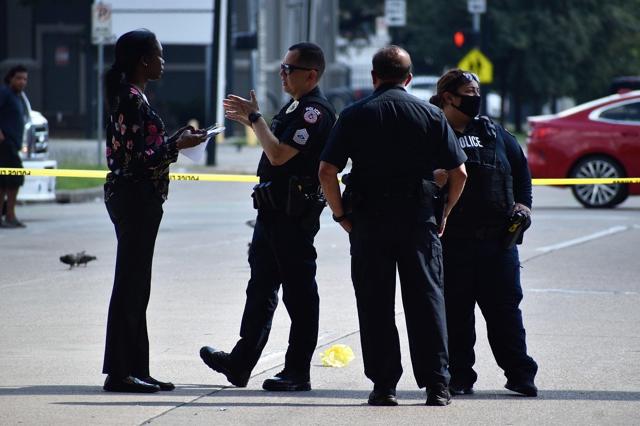 african american woman, detective, cops, mexican, latino, teamwork, communication, houston, texas, crime scene, undercover police officer, black woman, 2024, rare action photos, emergency, first responders, danger, guns, deadly, murder scene, reporter, arrested by police detective, news 2023-2024